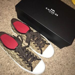 Brown and White Coach sneakers/tennis shoes